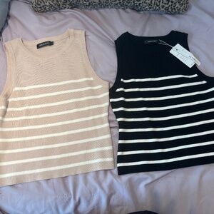 Two stylish fitted tanks
